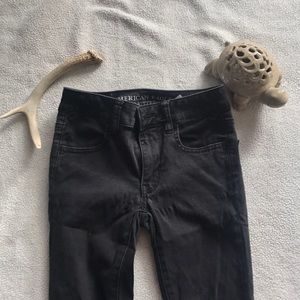 Faded black American eagle skinny jeans